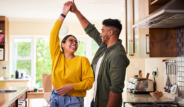 Couple dancing in the kitchen